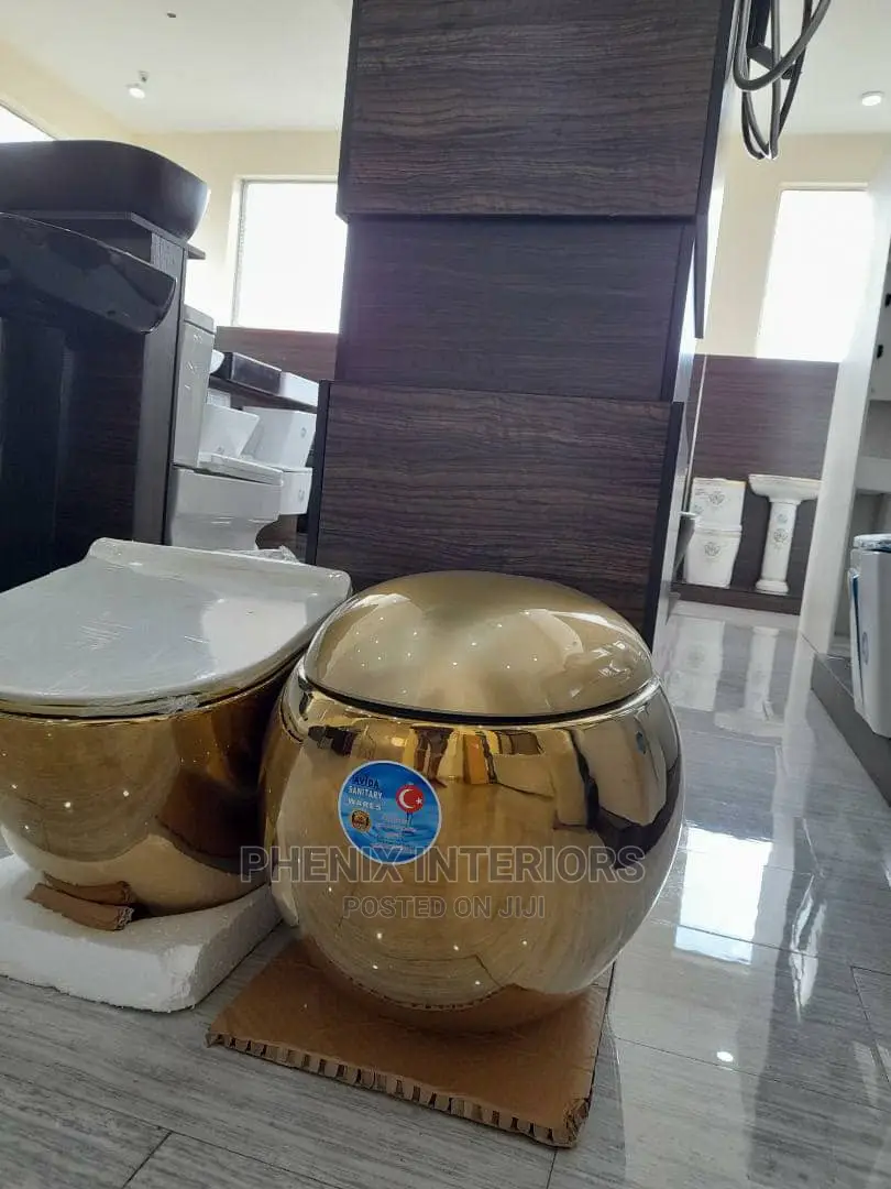 Egg Shaped Gold Wall Hung Concealed Water Closet