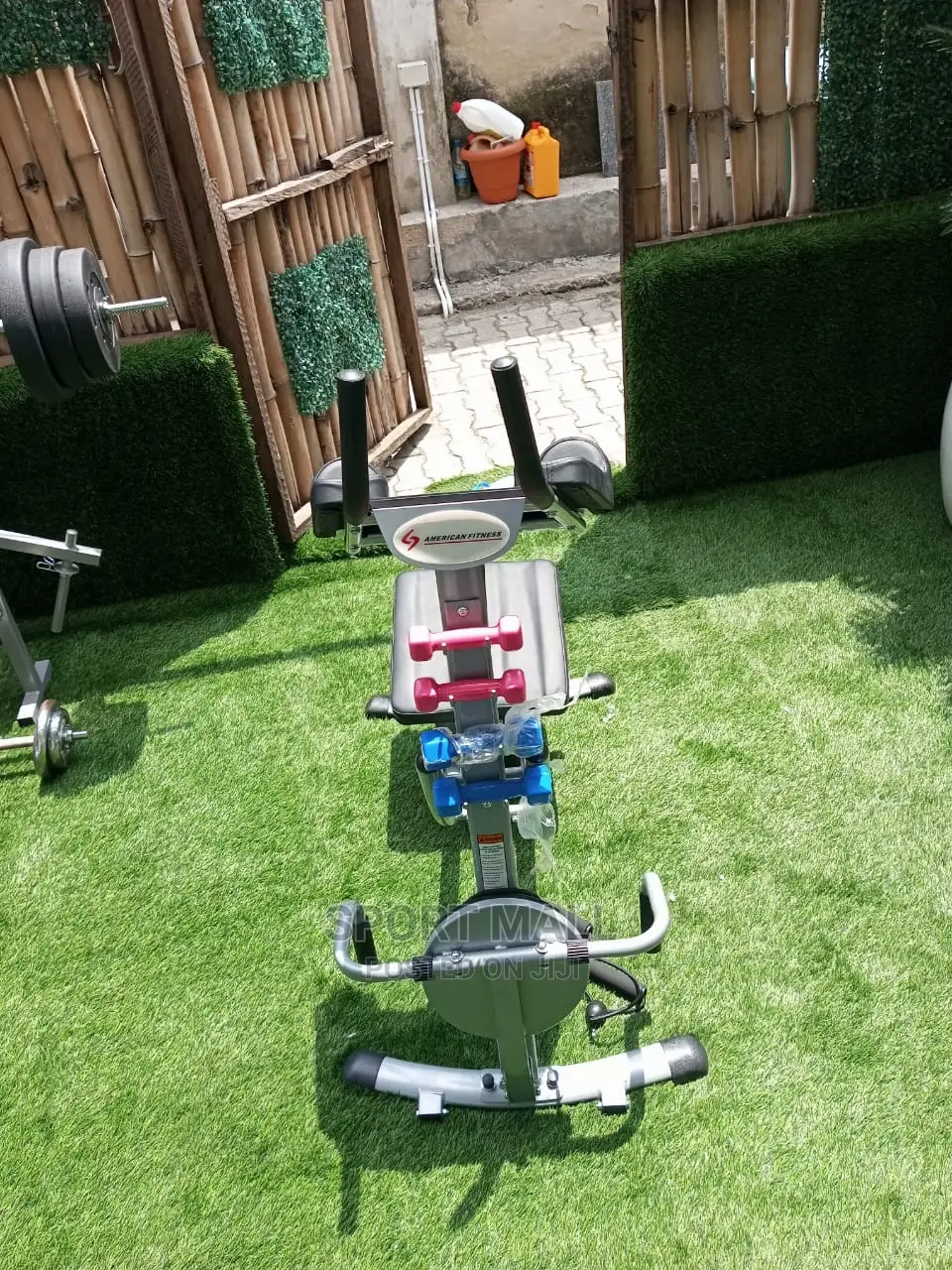 Ab Coaster With Twister Pedals and Dumbells.2029