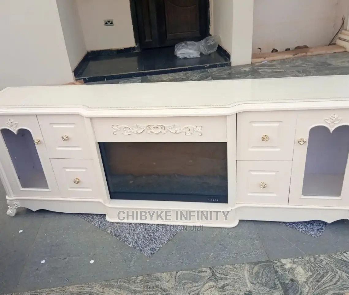 Wooden Cream or White Television Stand With Fireplace.