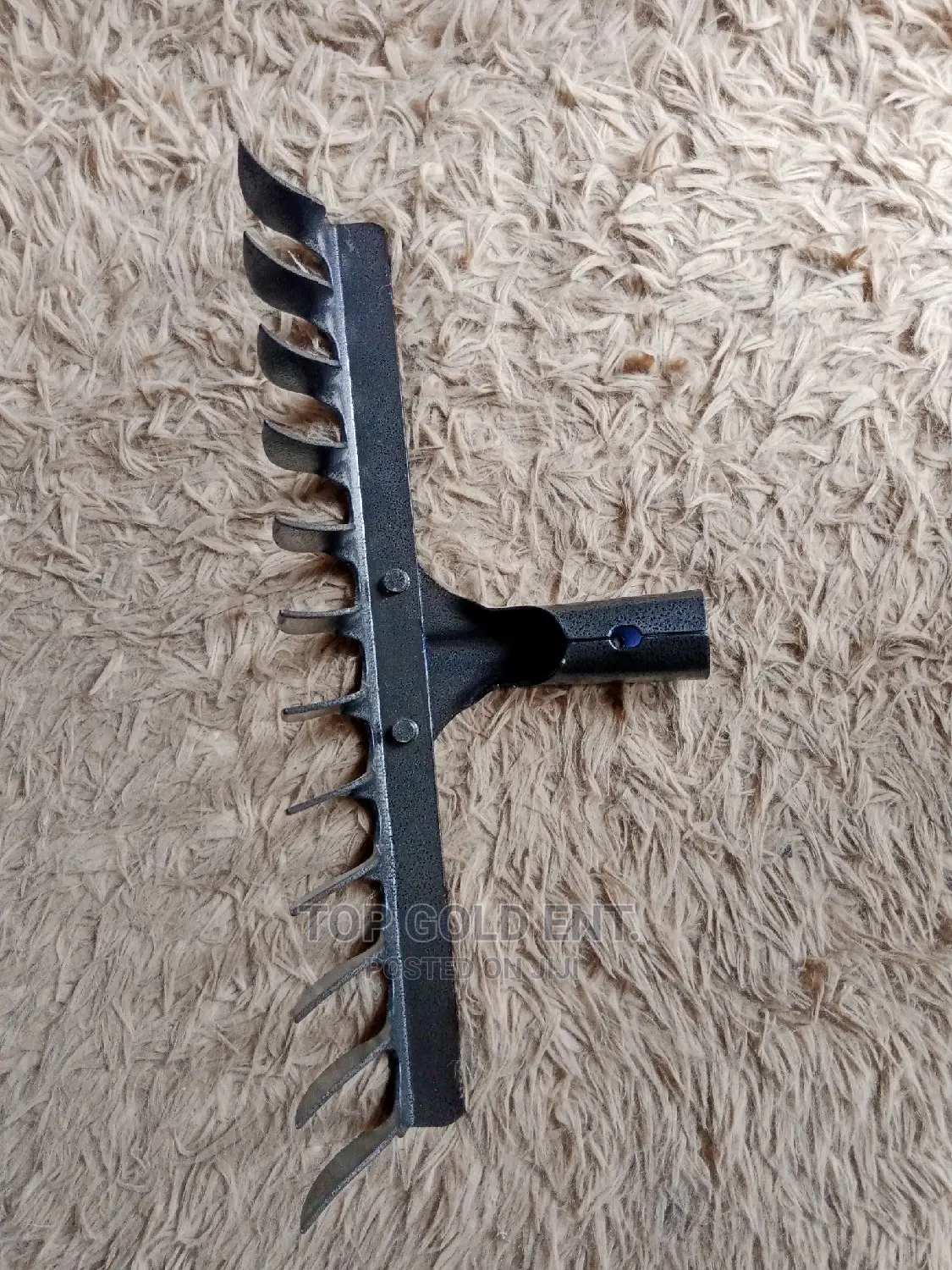 Rake With Wooden Pole