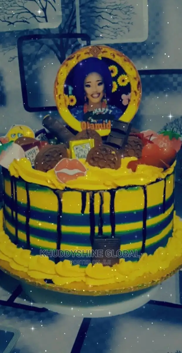 Yellow and Blue With Chocolates Topping Birthday Cakes