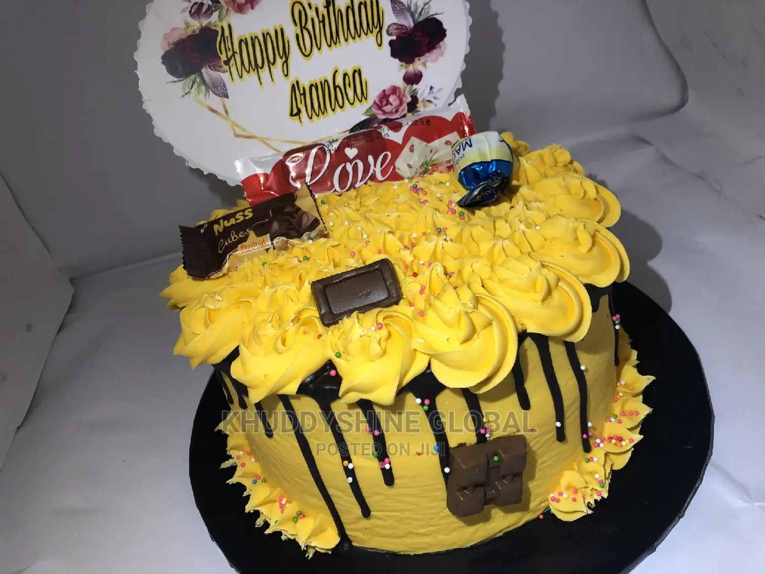 Golden Yellow With Chocolate Toppings Birthday Cakes