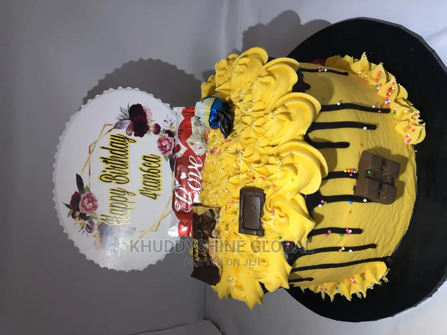 Golden Yellow With Chocolate Toppings Birthday Cakes