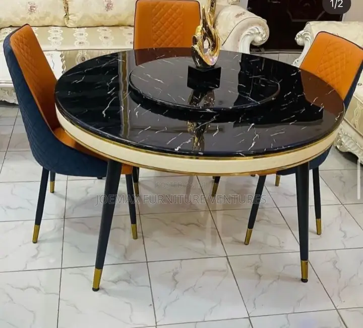 Round Royal Dining Table by 6 With Six Leather Chairs.