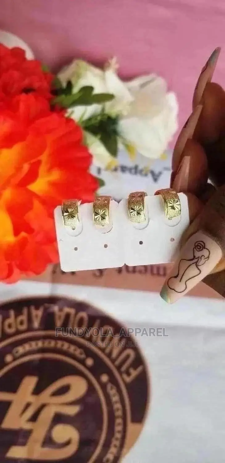 Female Gold Clip on Earrings