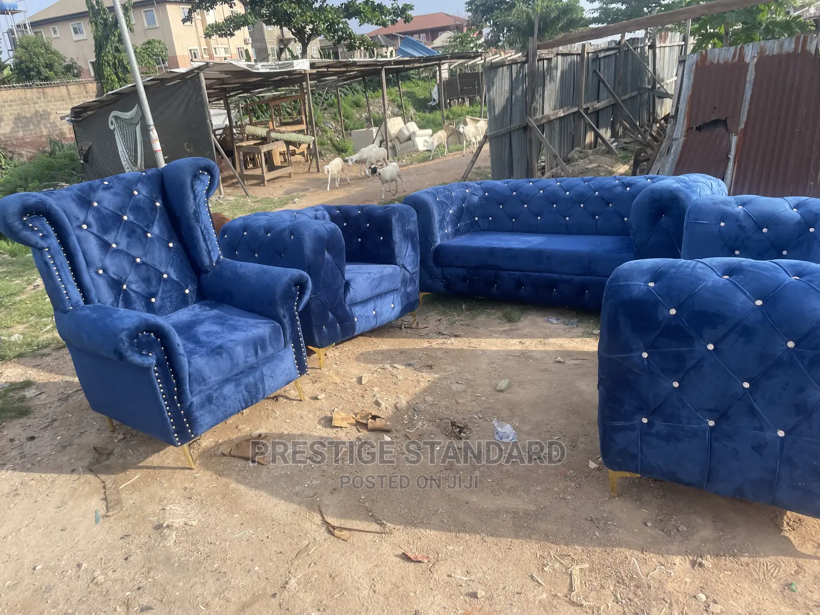 A Standard Chesterfield Sofa With Royal Chair