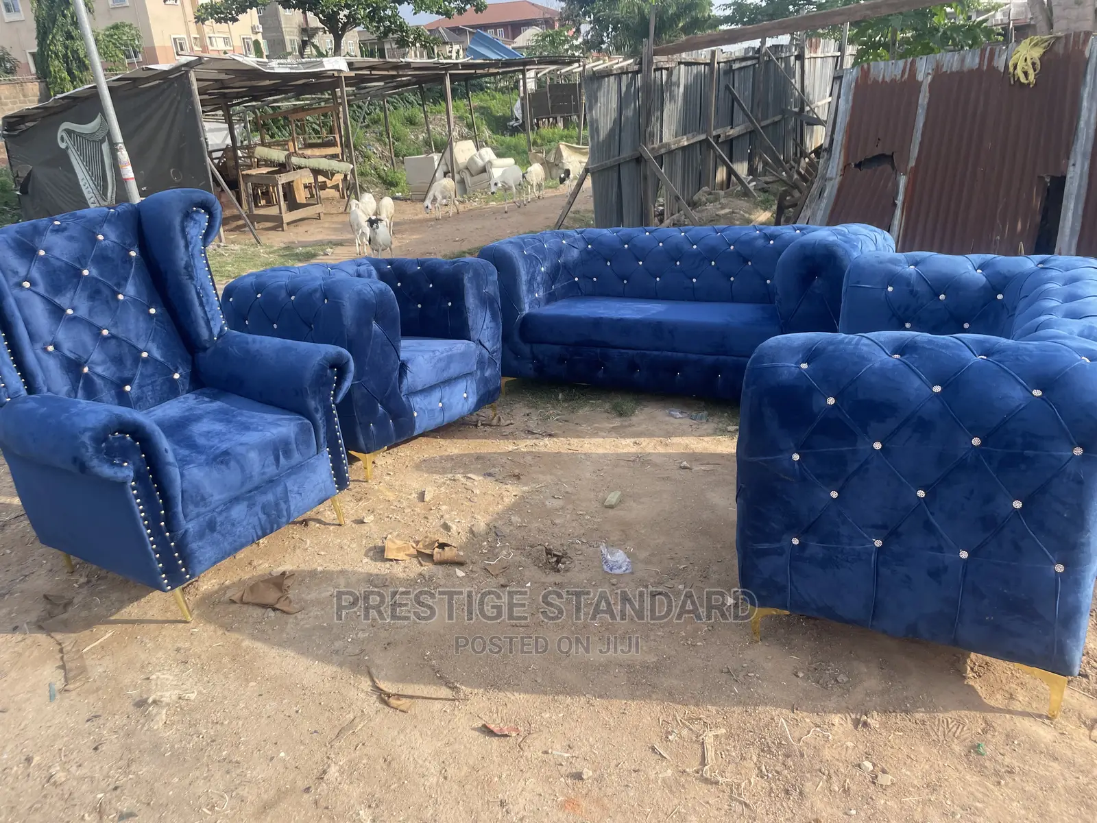 A Standard Chesterfield Sofa With Royal Chair