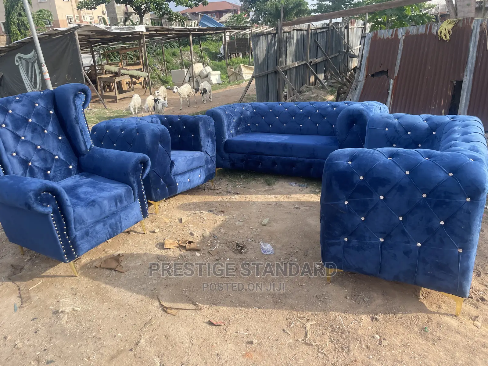 A Standard Chesterfield Sofa With Royal Chair