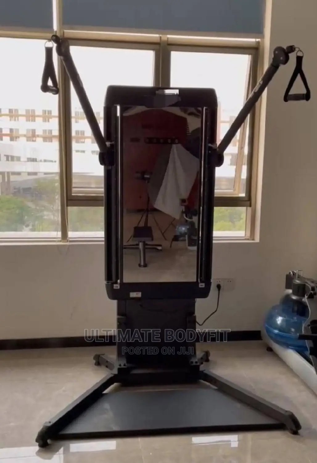 Dual Cable Crossover Trainer, Adjustable Arms Description