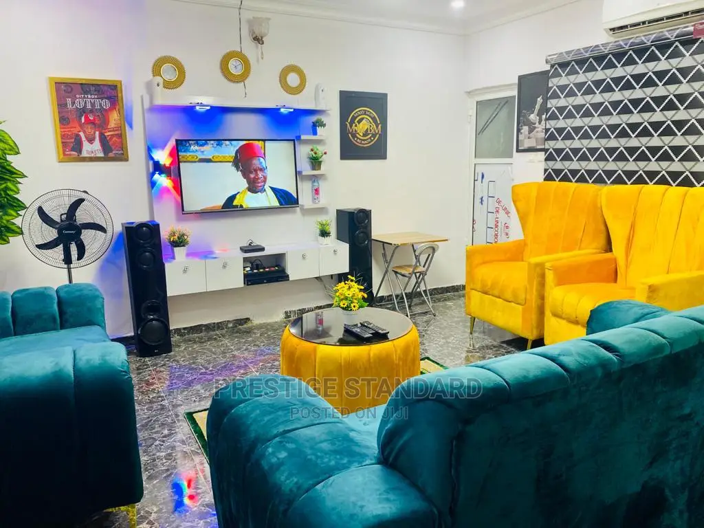 A Standard Living Room Sofa With Center Table