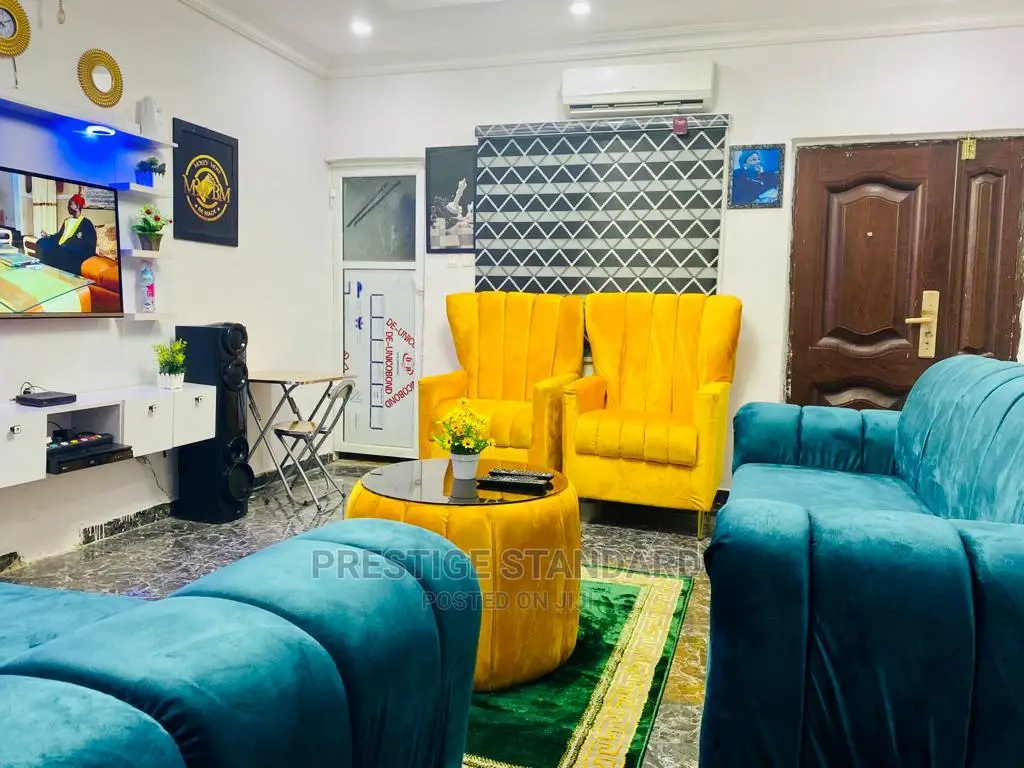 A Standard Living Room Sofa With Center Table