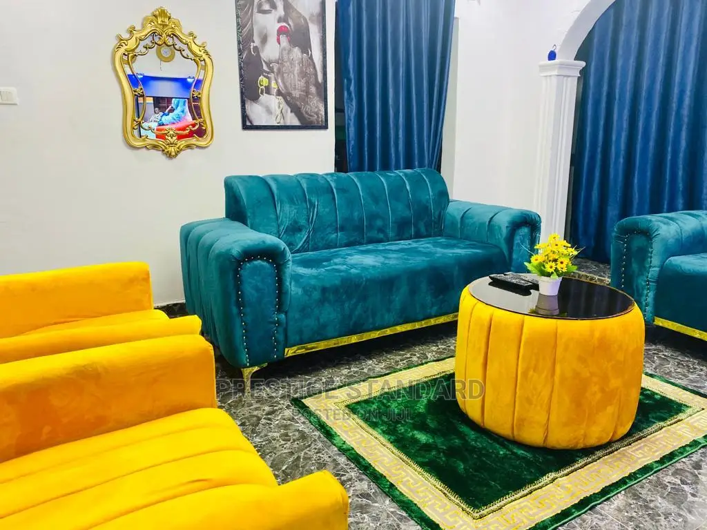 A Standard Living Room Sofa With Center Table