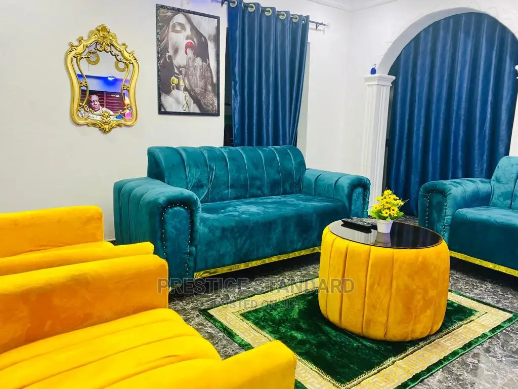 A Standard Living Room Sofa With Center Table