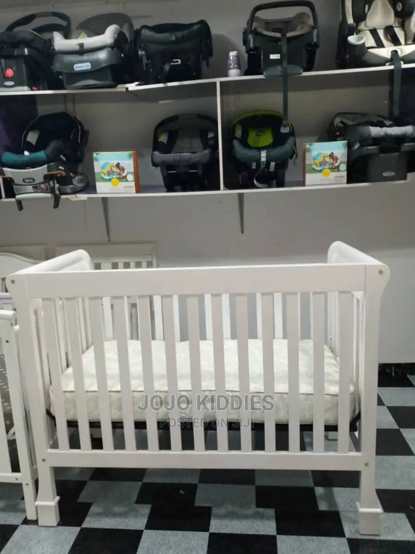 US Used Infant to Toddler Wooden Bed With Mattress