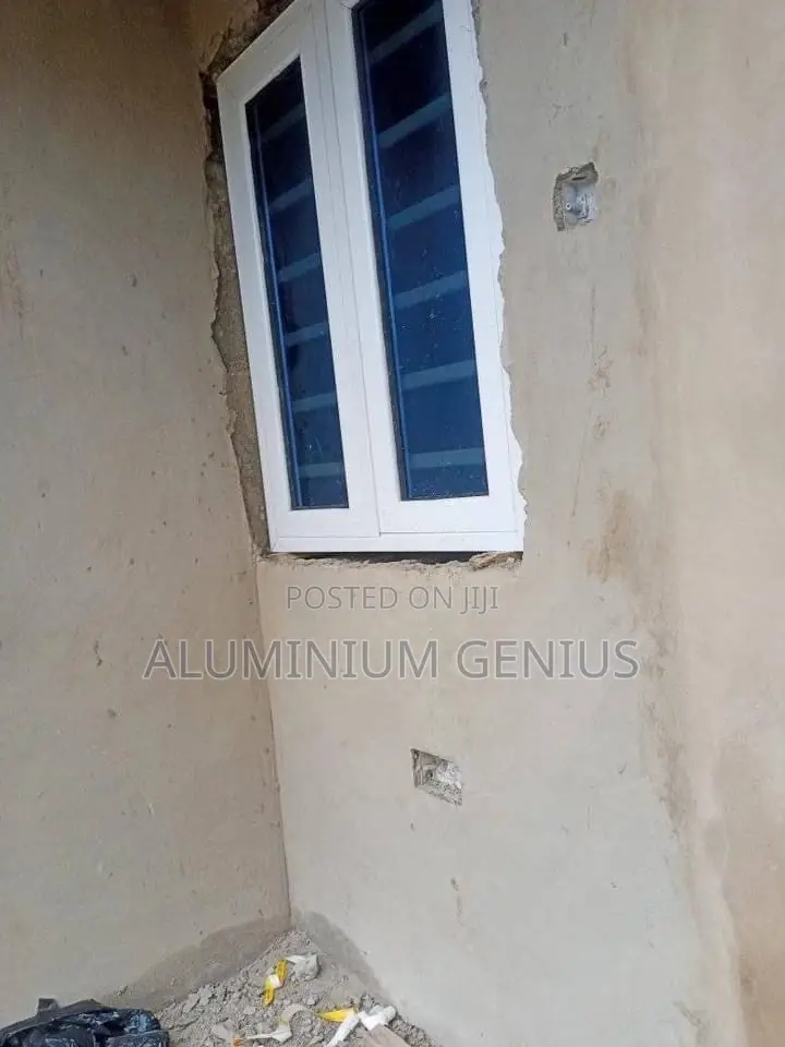 White Casement Window With Burglary and Net