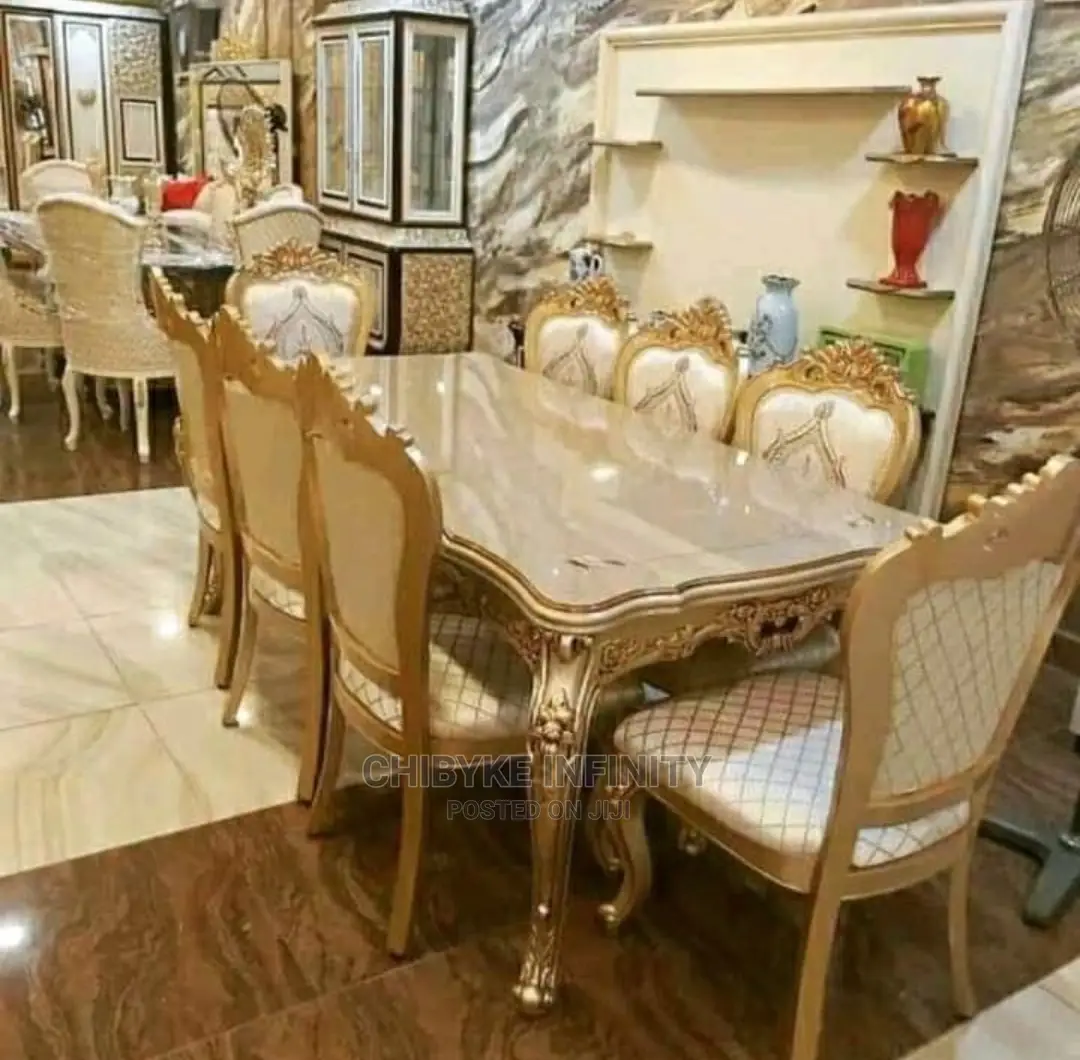 Wooden Top Royal Dinning Table With Eight Sitter Chairs