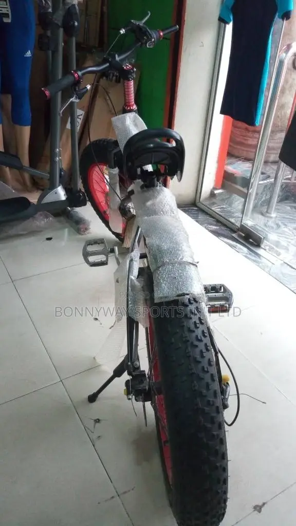 Children Big Tires Riding Bicycle
