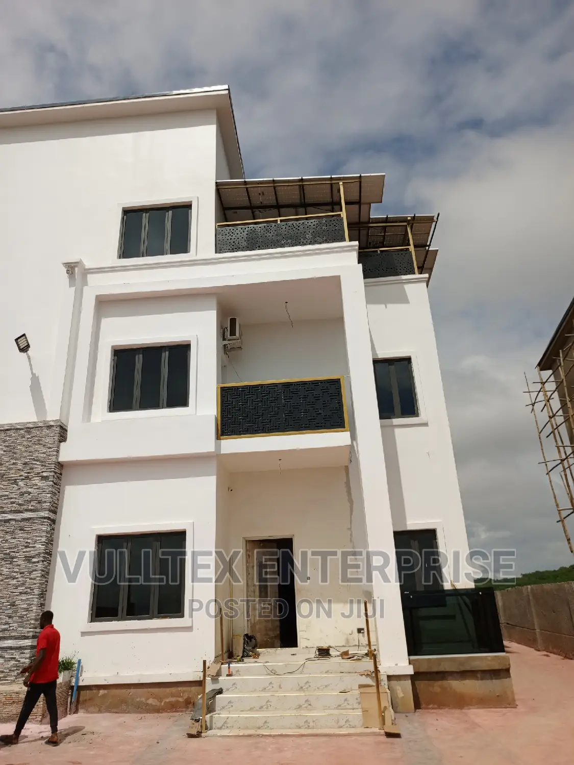 Balcony Gold Rail and Gray Glass