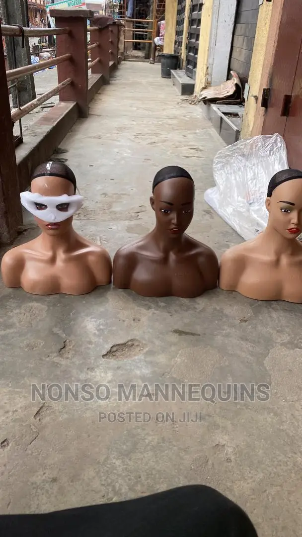 Different Shades Of Female Mannequin Heads With Shoulder