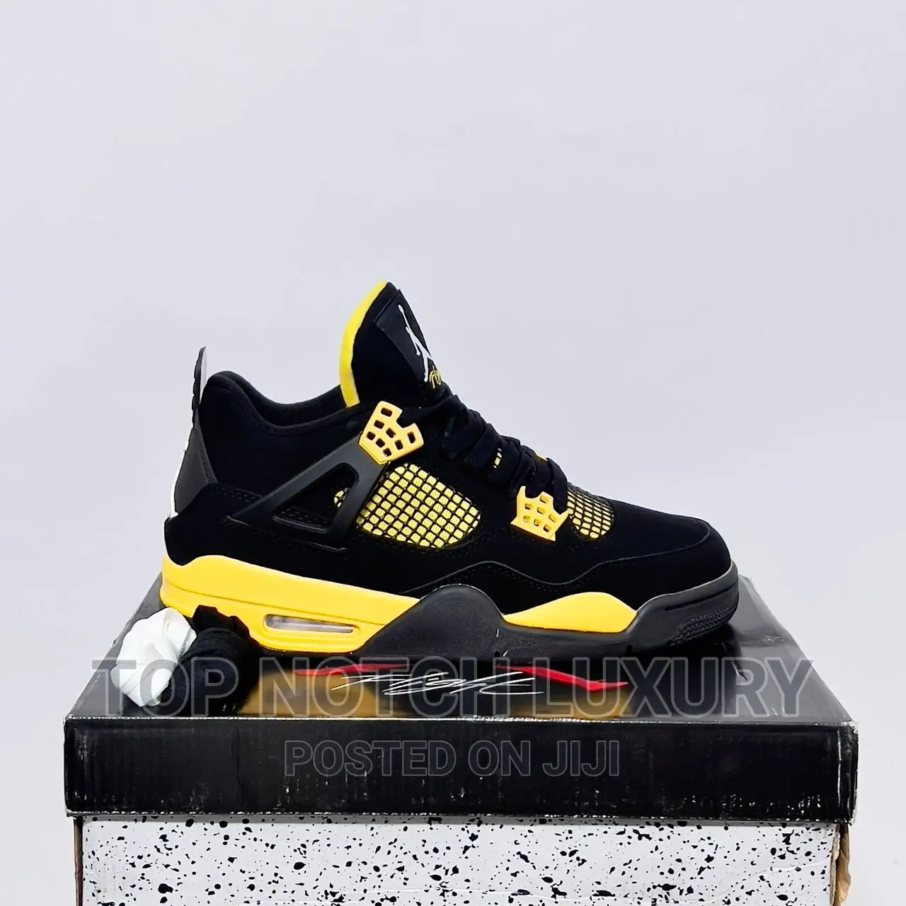 *AIR JORDAN 4 RETRO “Thunder” Black/Yellow*