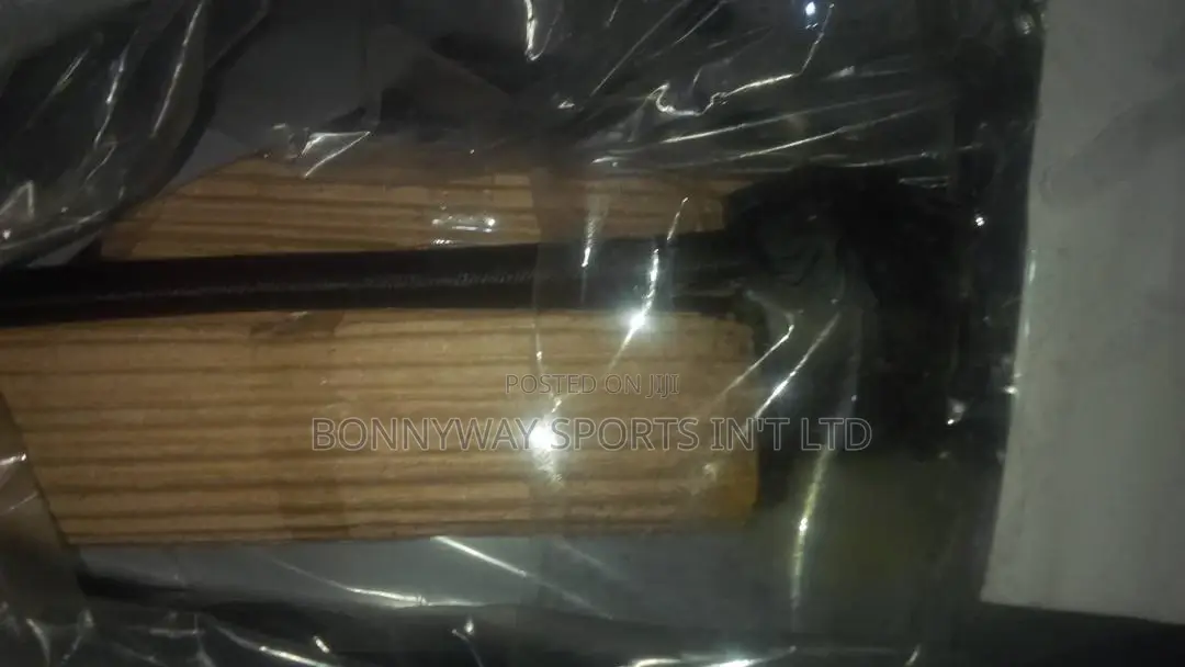 The Young Situp Bench With a Pair of Dumbells Nd Rope