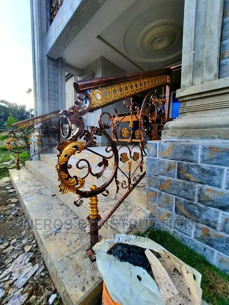 China Rosette and Emoney Cumbi Wrought Iron Rail