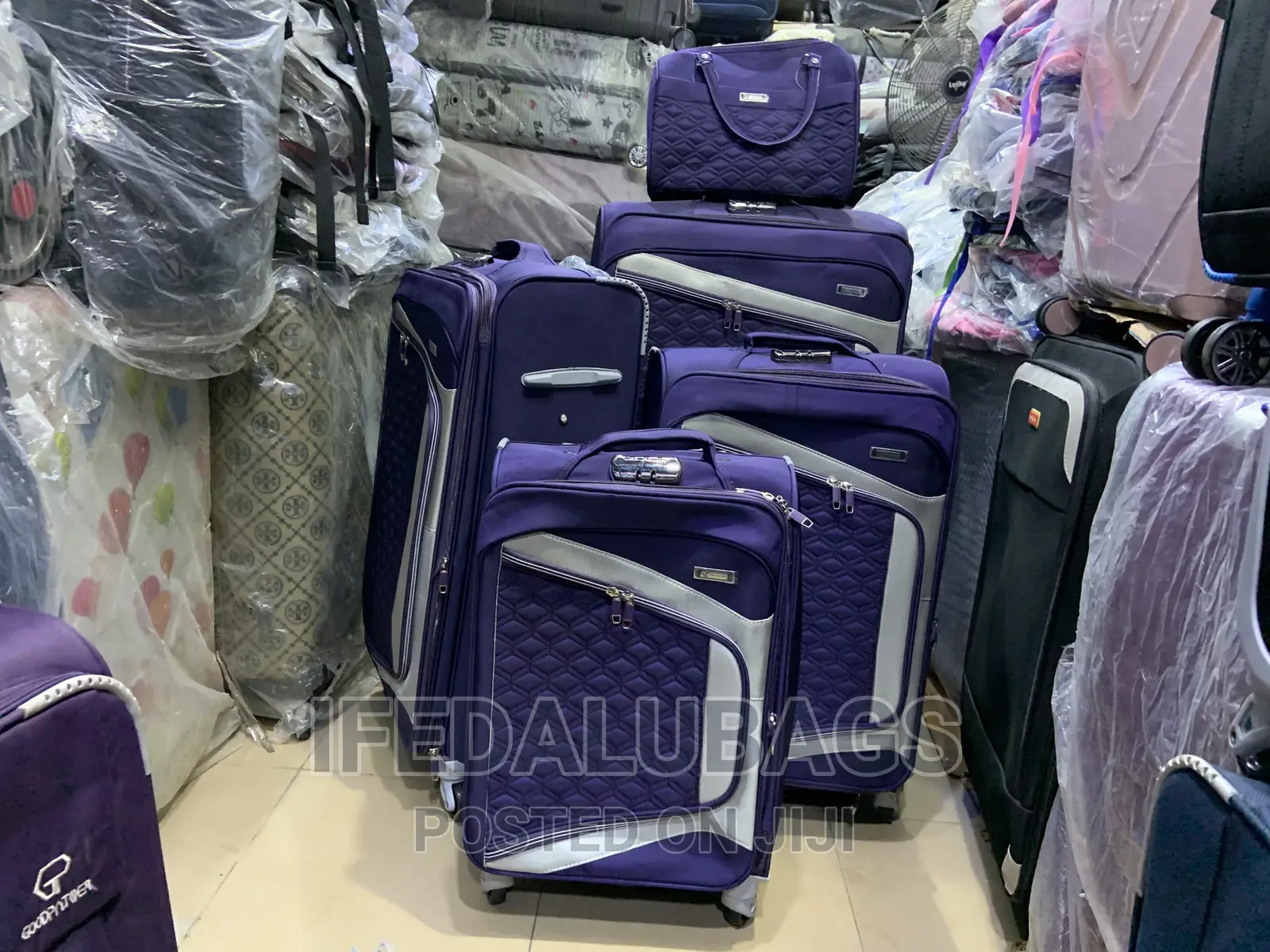 Set of Purple Star Express Travel Luggage