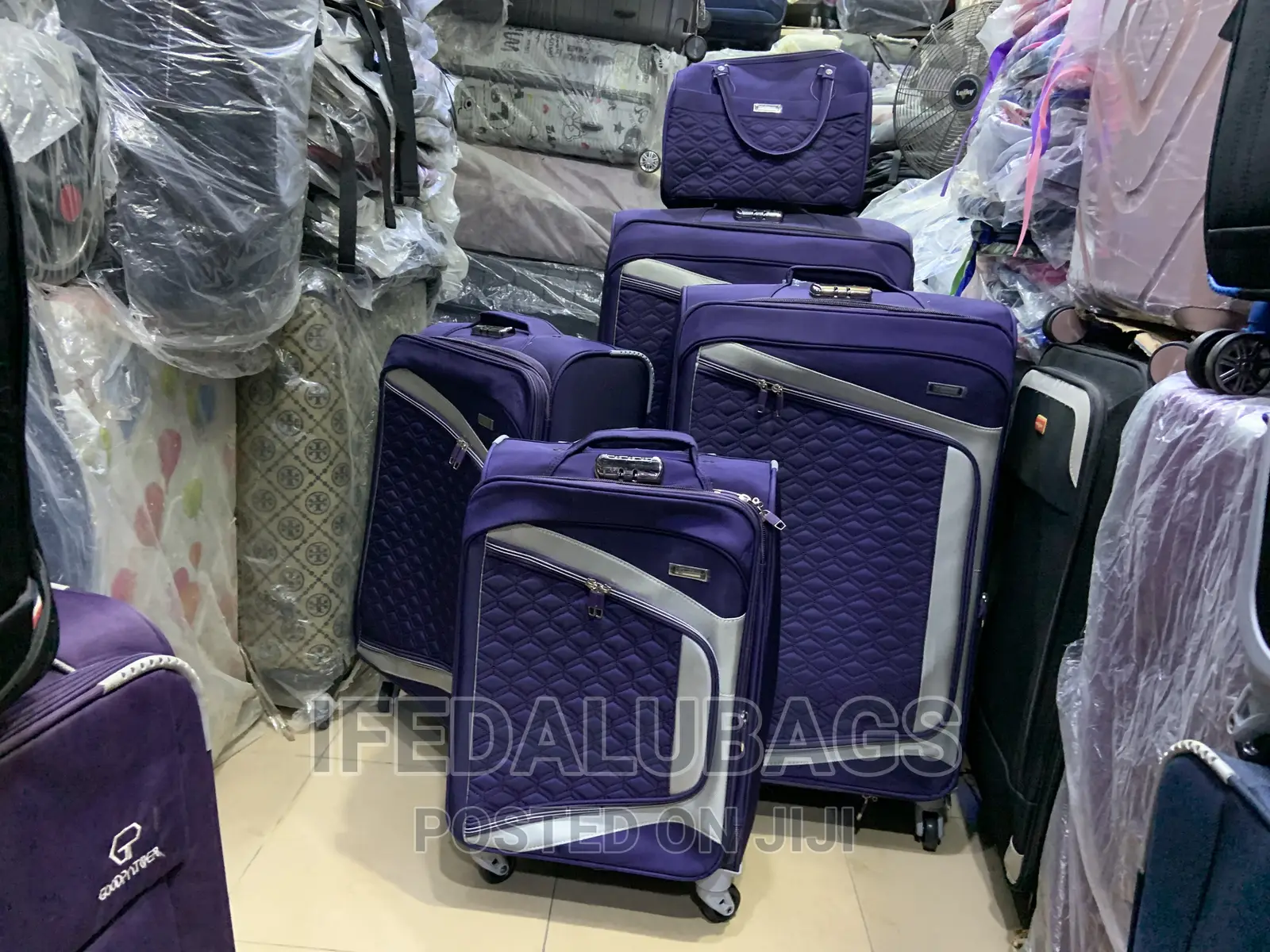 Set of Purple Star Express Travel Luggage