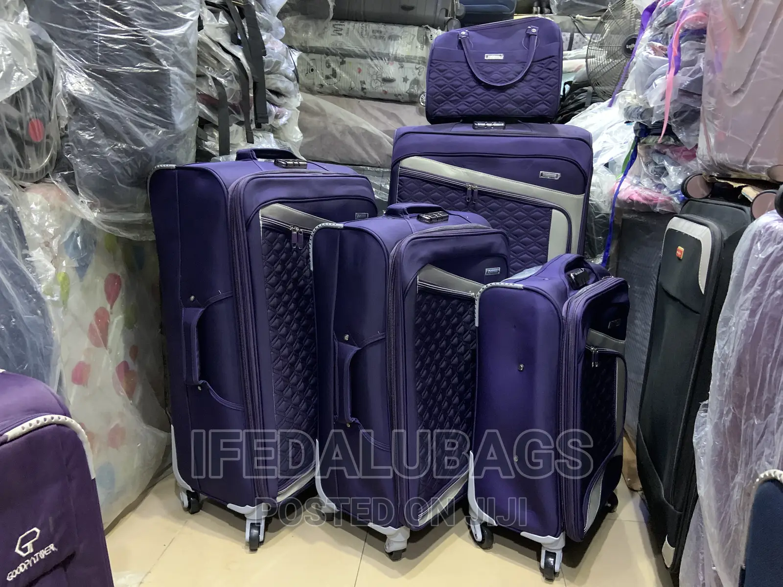 Set of Purple Star Express Travel Luggage