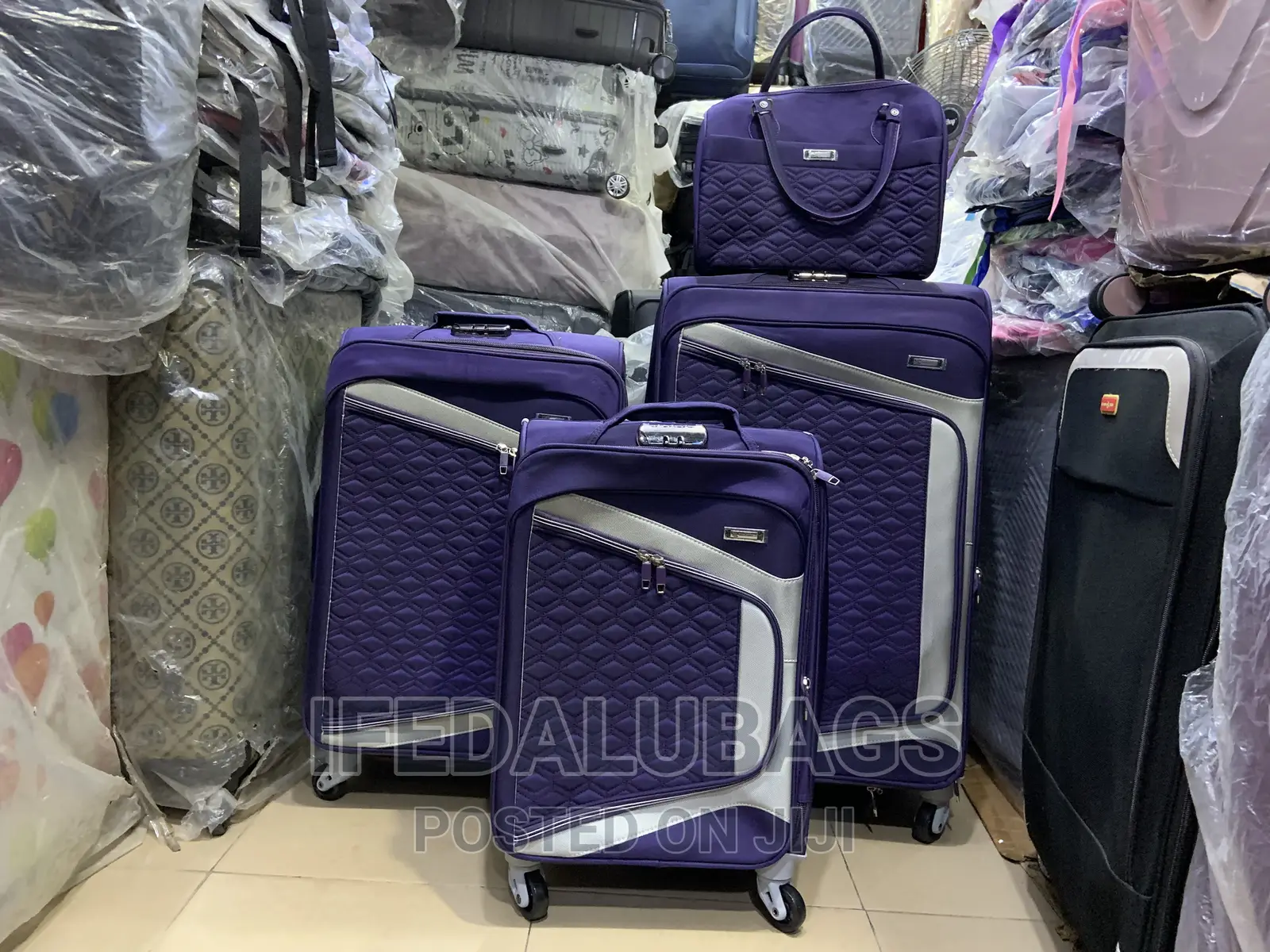 Set of 4 Purple Star Express Travel Luggage