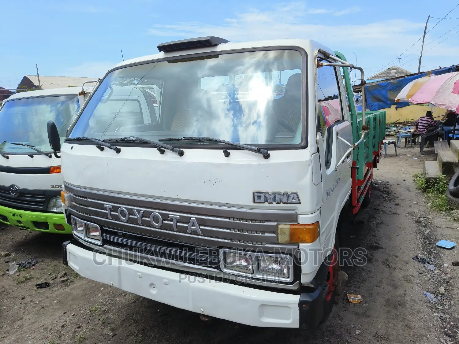 Toyota Dyna 300 With Red N Light Green Bucket