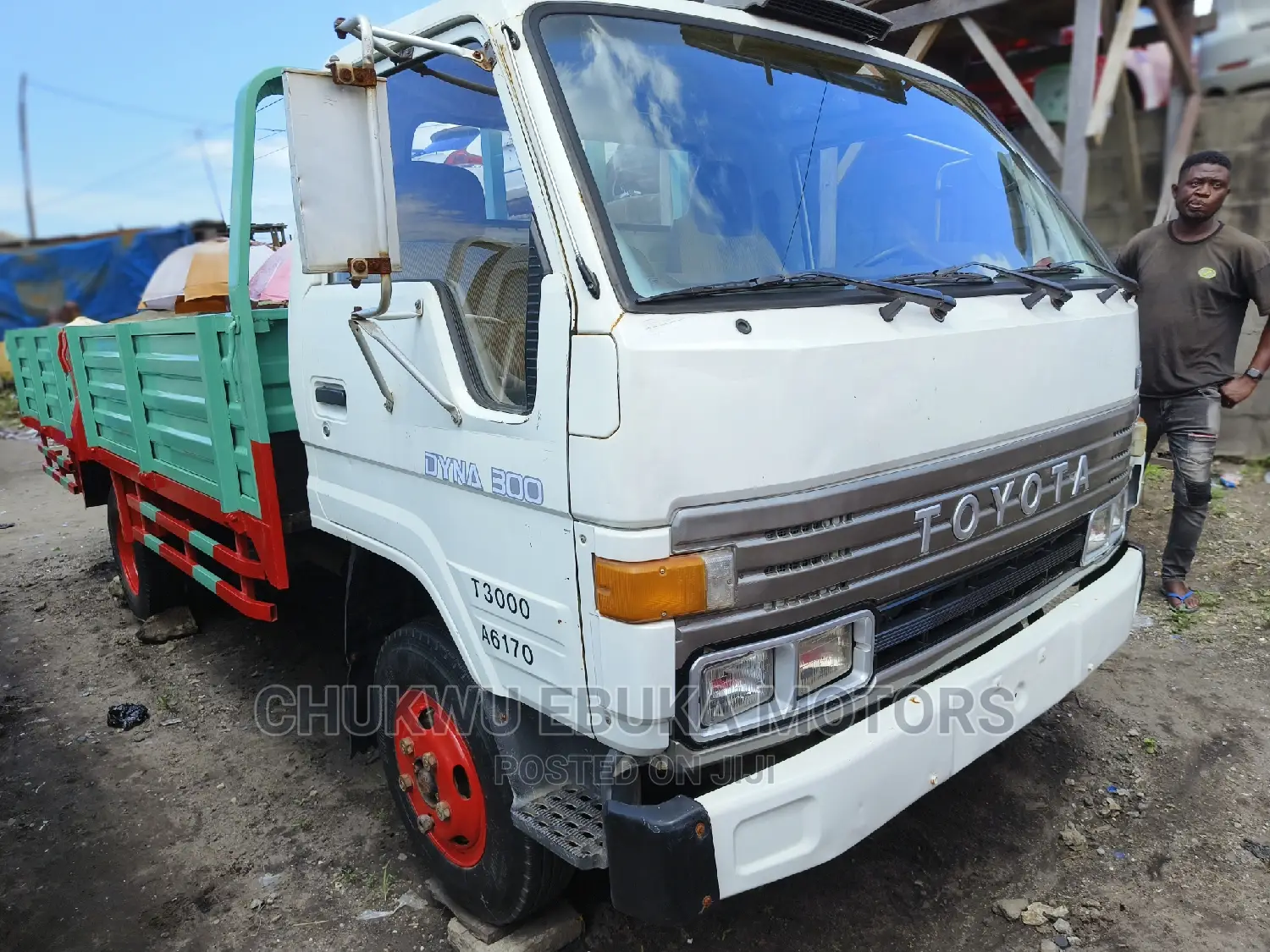Toyota Dyna 300 With Red N Light Green Bucket