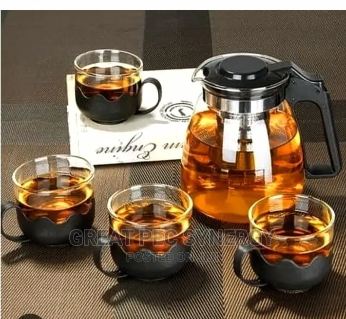 Tea Pot and 4 Glass Cups