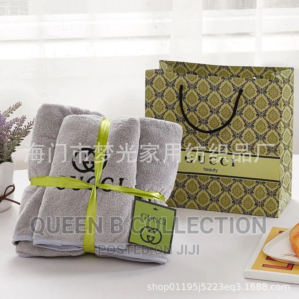 Designer 2 in 1 Towel With Carrier Bag.
