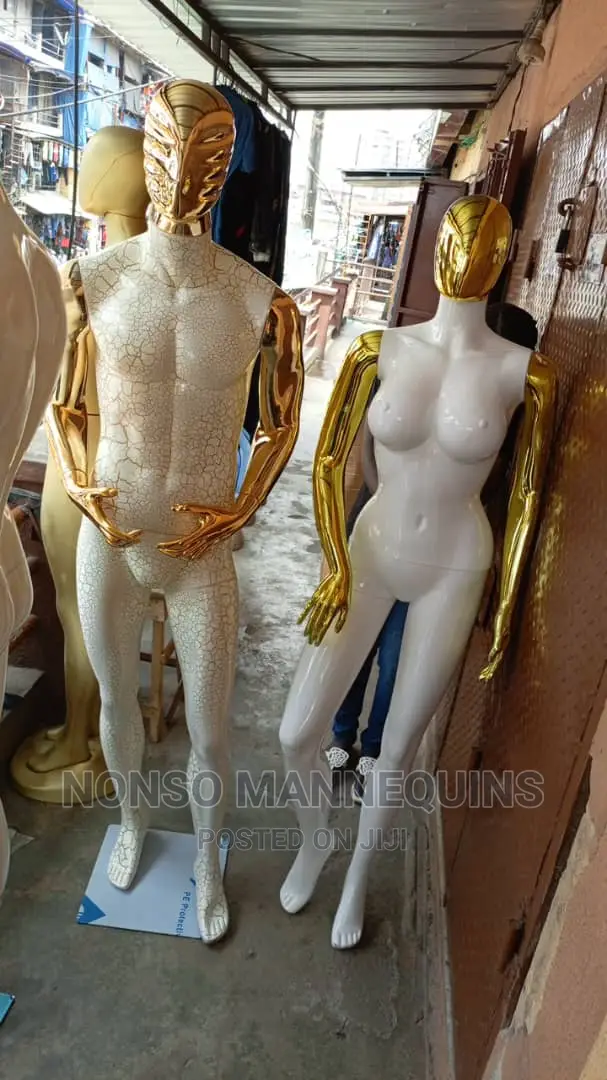 Male and Female White and Gold Mannequins