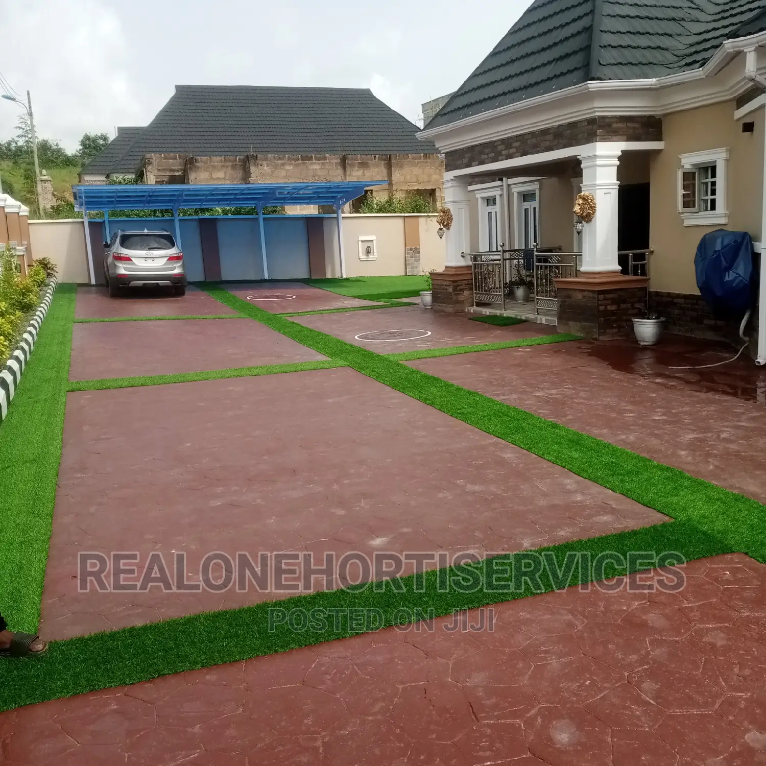 Concrete Stamped Floor With Artificial Green Border