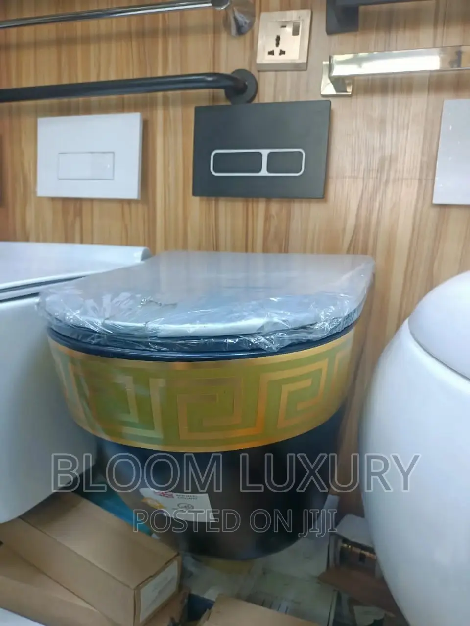 Black+Gold Conceal Toilet Available