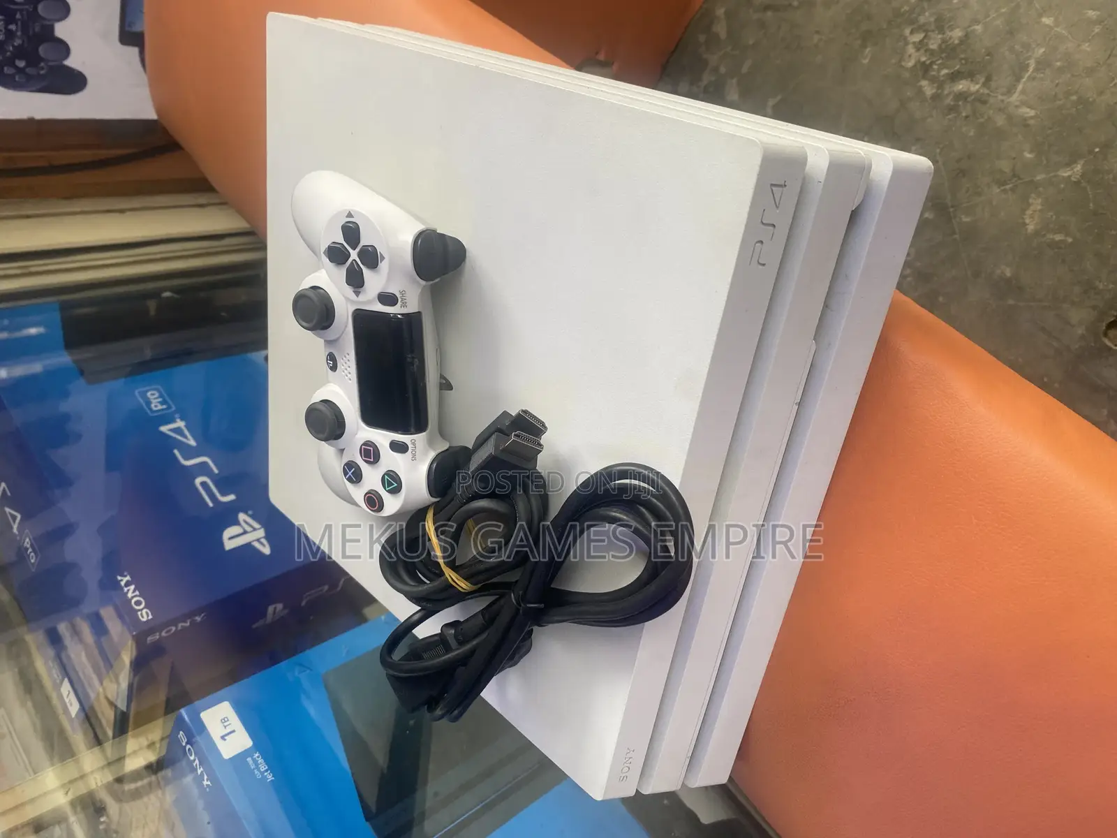 PS4 PRO + 9 Installed Games Both FIFA24,MK,GTA5, More