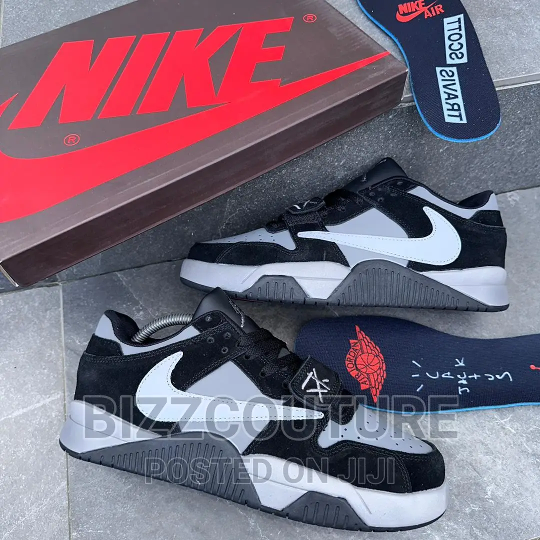 Original TRAVIS SCOTT Jordan Cut Check Available in Store