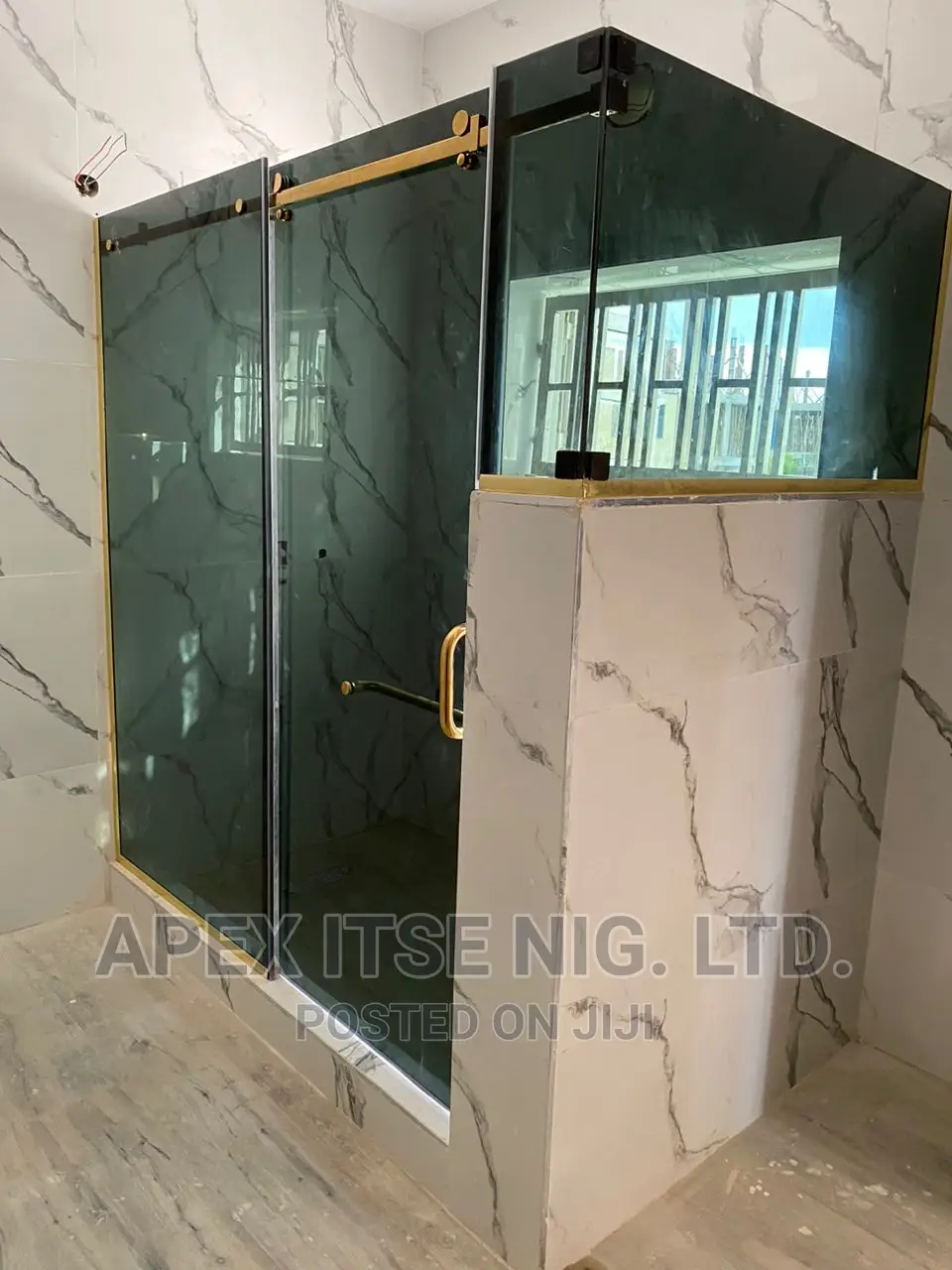 Grey Glass Gold Fitting Cubicle