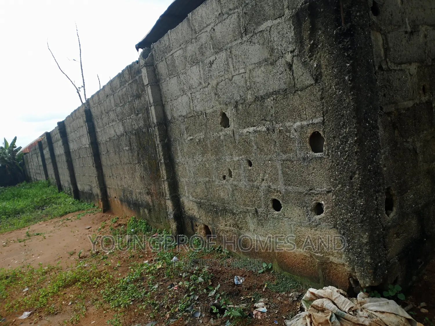 A Plot of Land Fenced With Gate at Igando