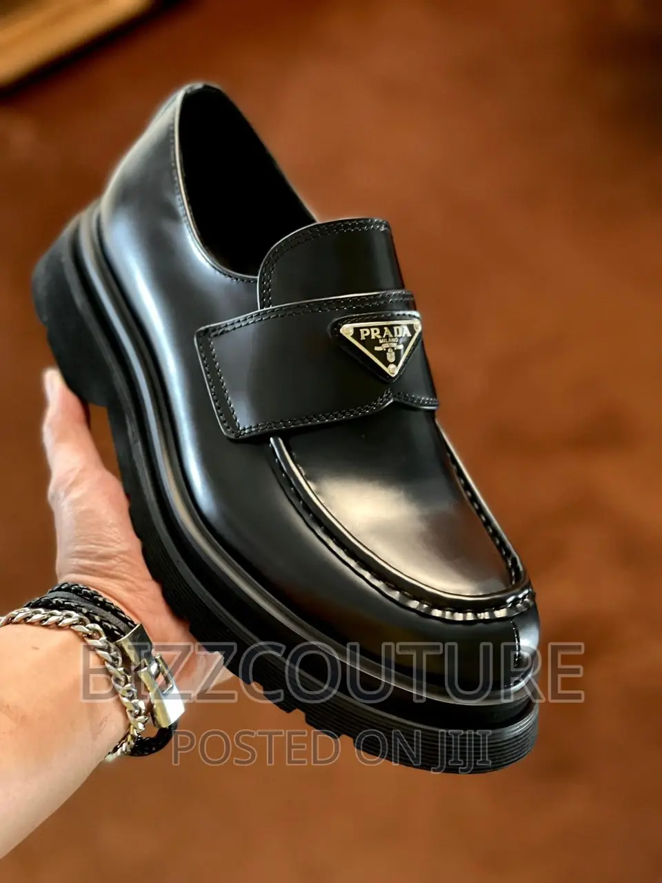 Original PRADA Logo Plaque Loafers Available in Store
