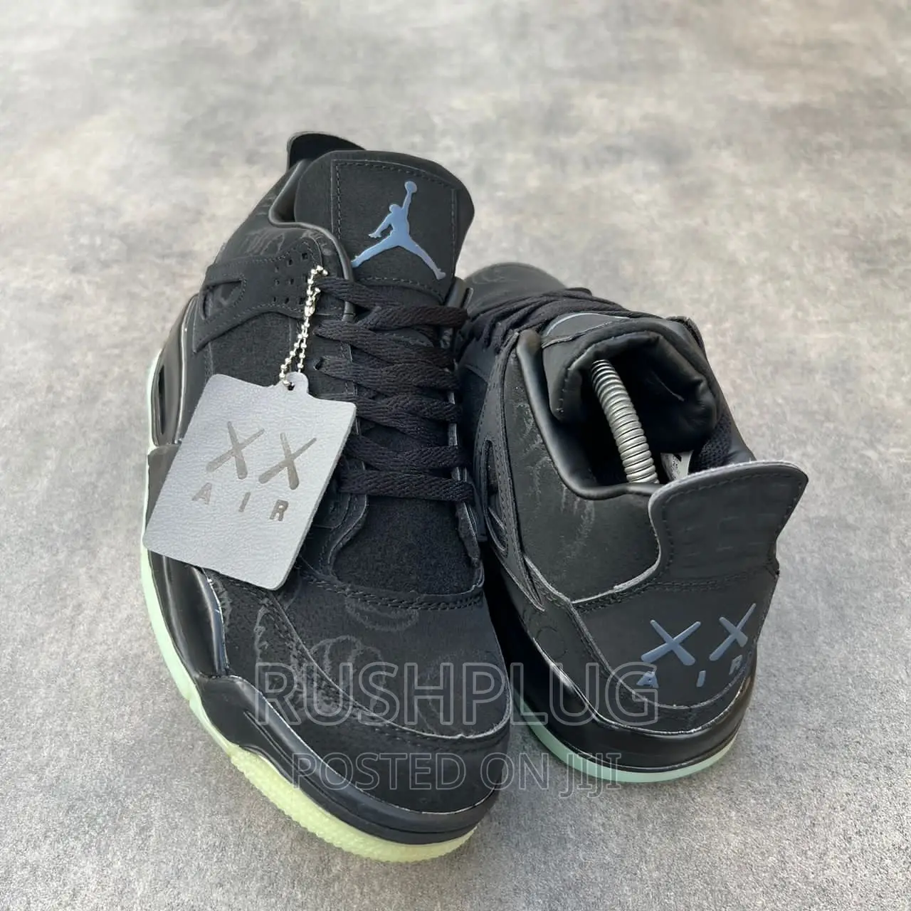 Air Jordan 4 All Black “Kaws”(Dark Glow)