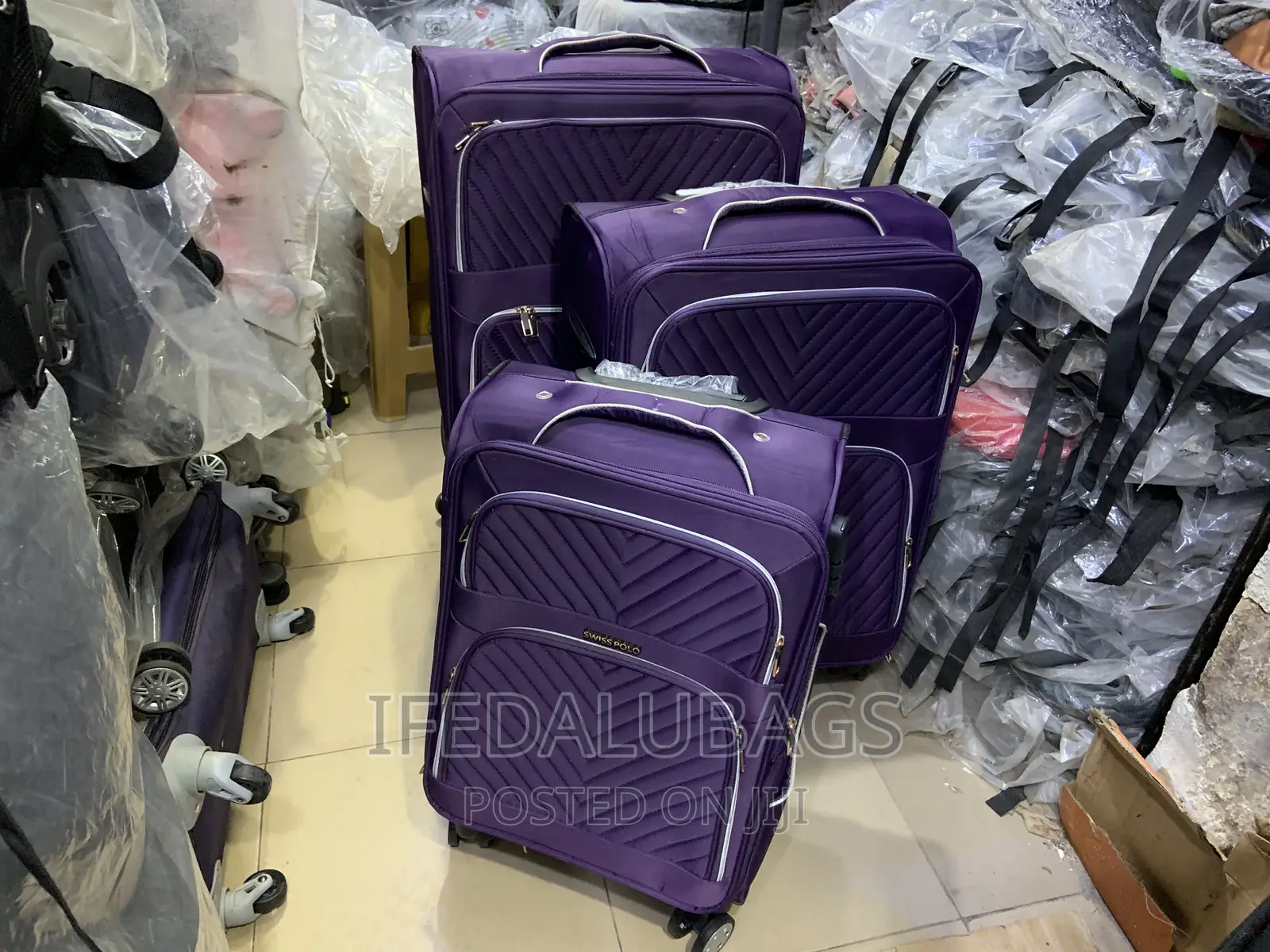 Set of Purple Swiss Polo Travel Luggage