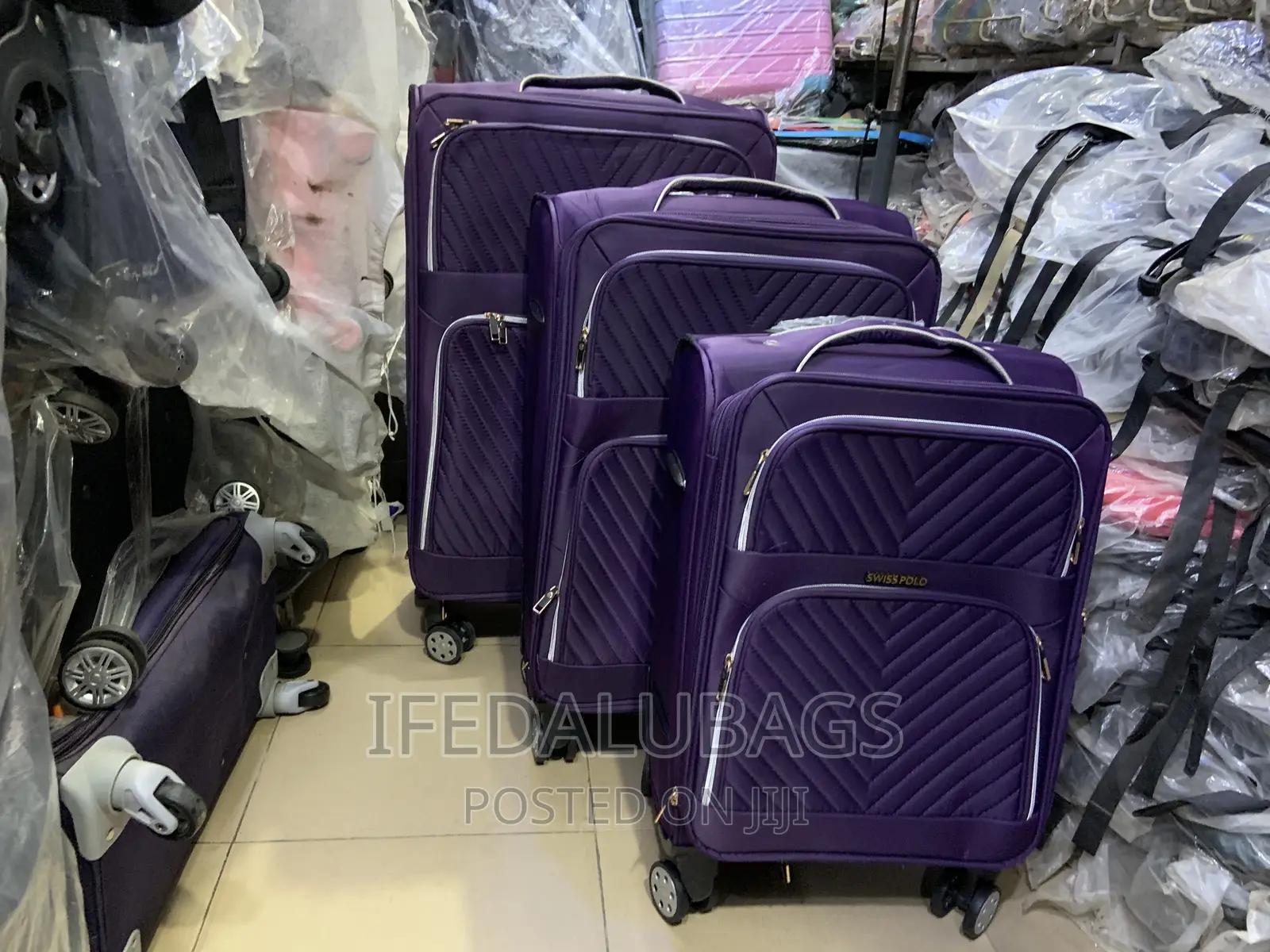 Set of Purple Swiss Polo Travel Luggage