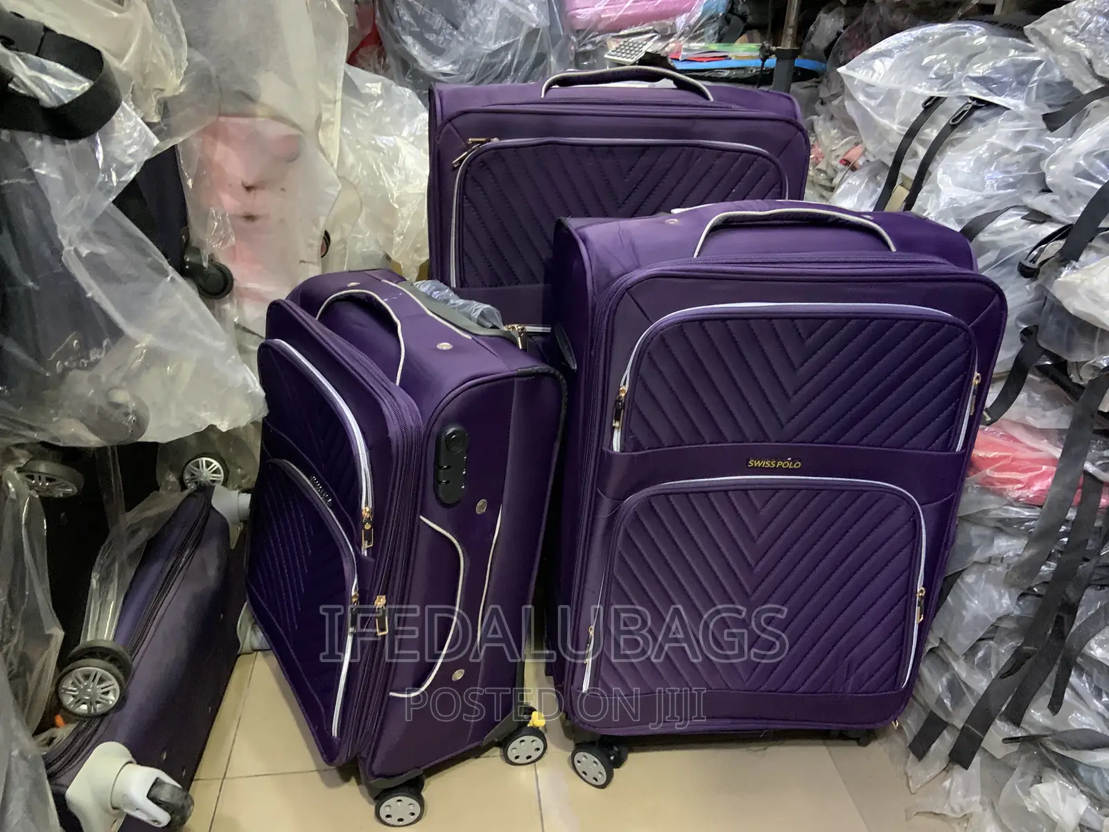 Set of Purple Swiss Polo Travel Luggage