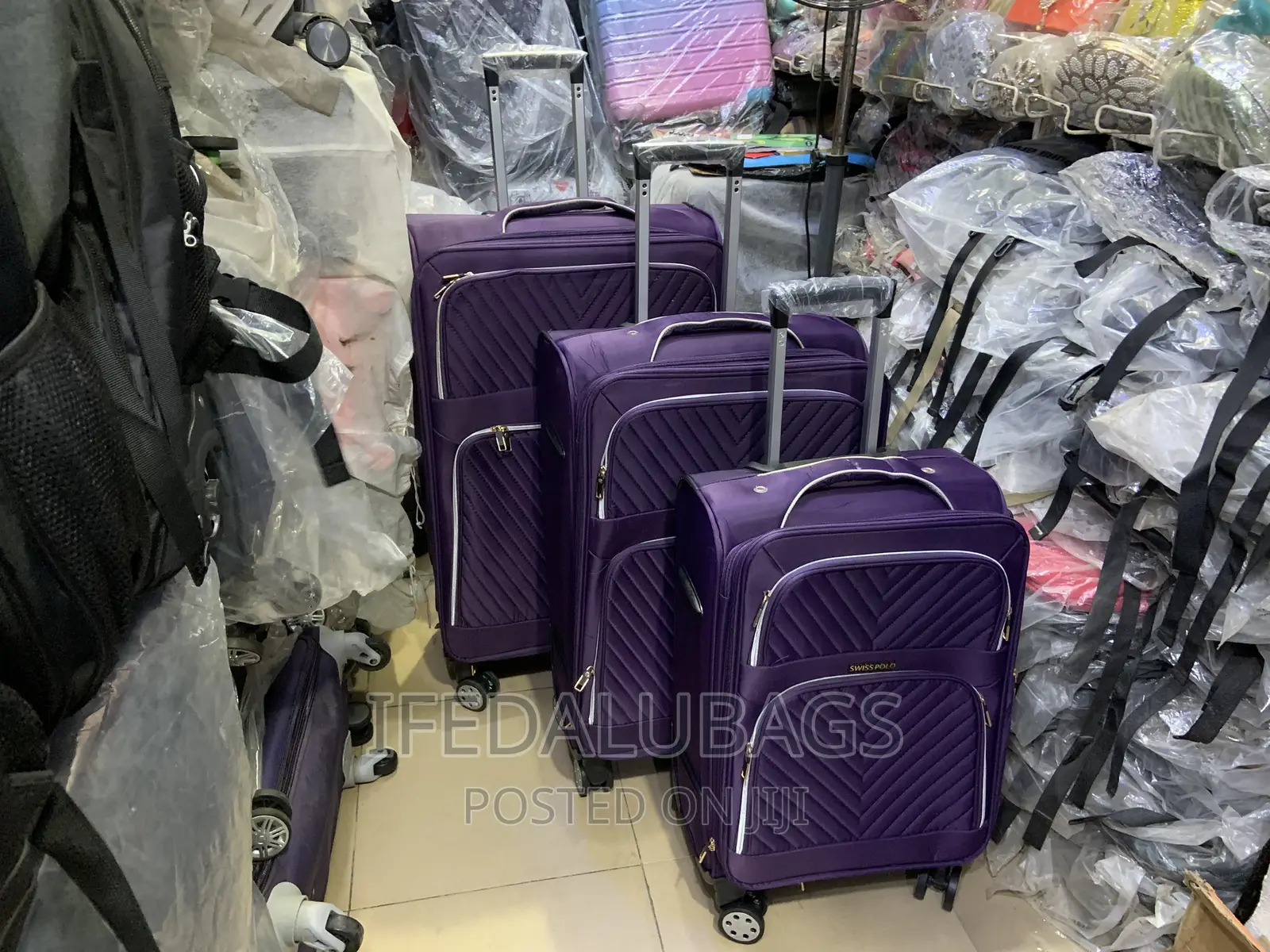 Set of Purple Swiss Polo Travel Luggage