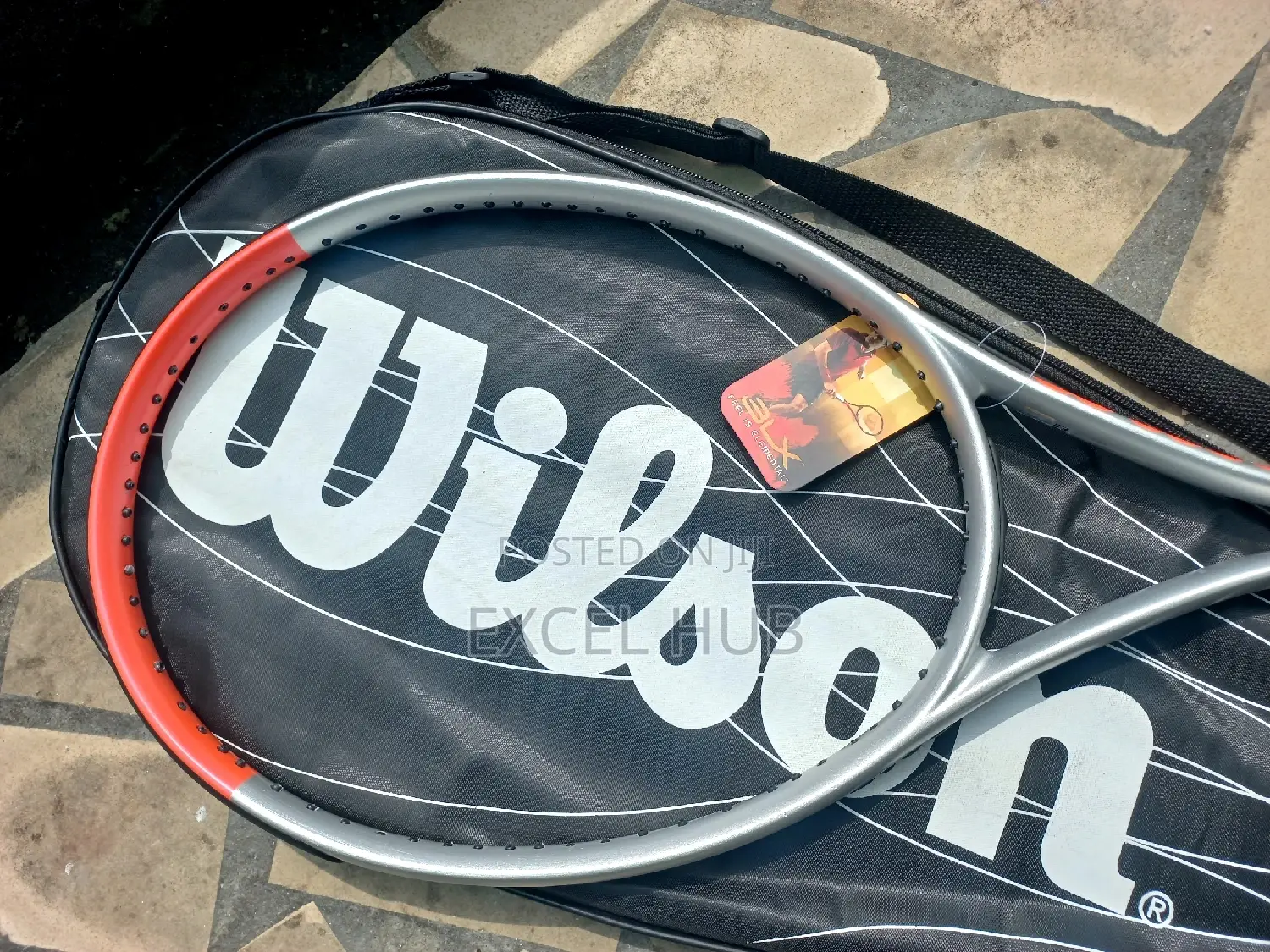 Wilson Tennis Racket Orange And Silver