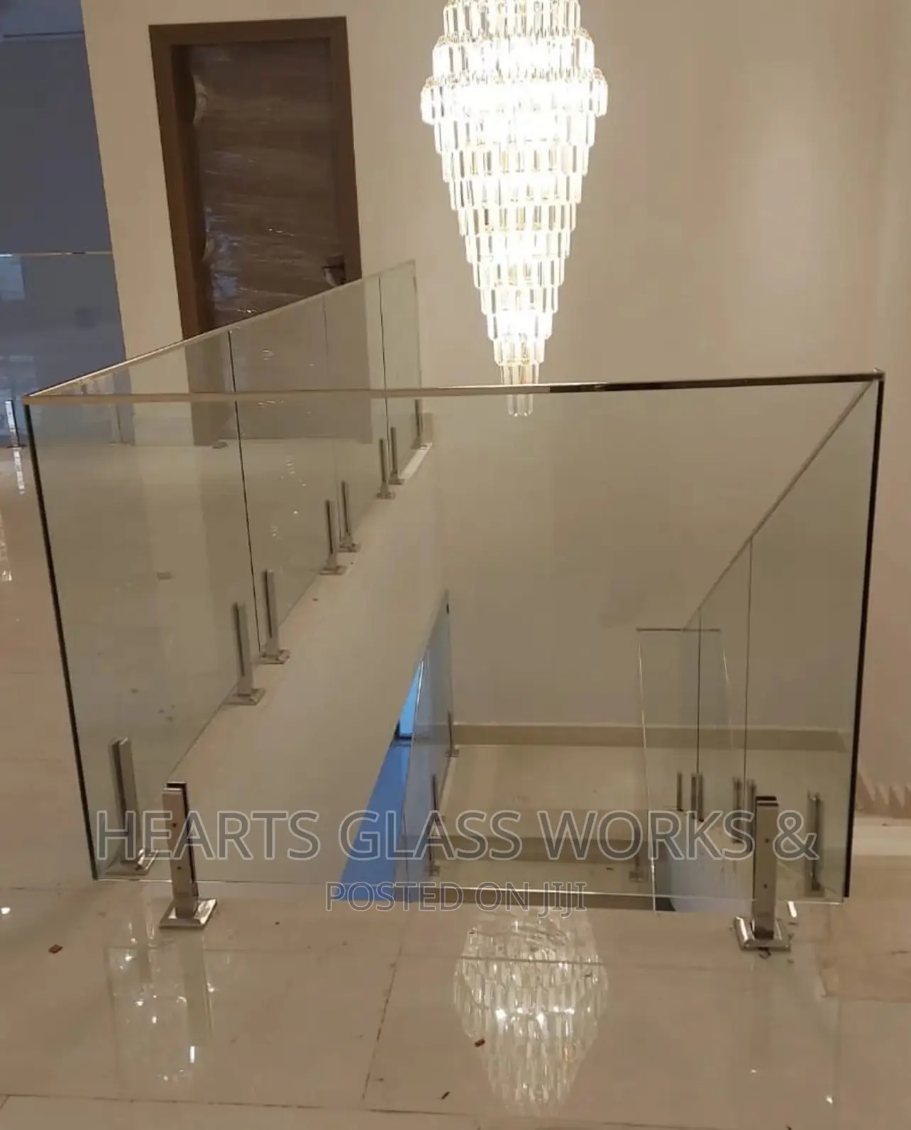 Frameless Glass Railing - Spigot Stand Silver Top Rail
