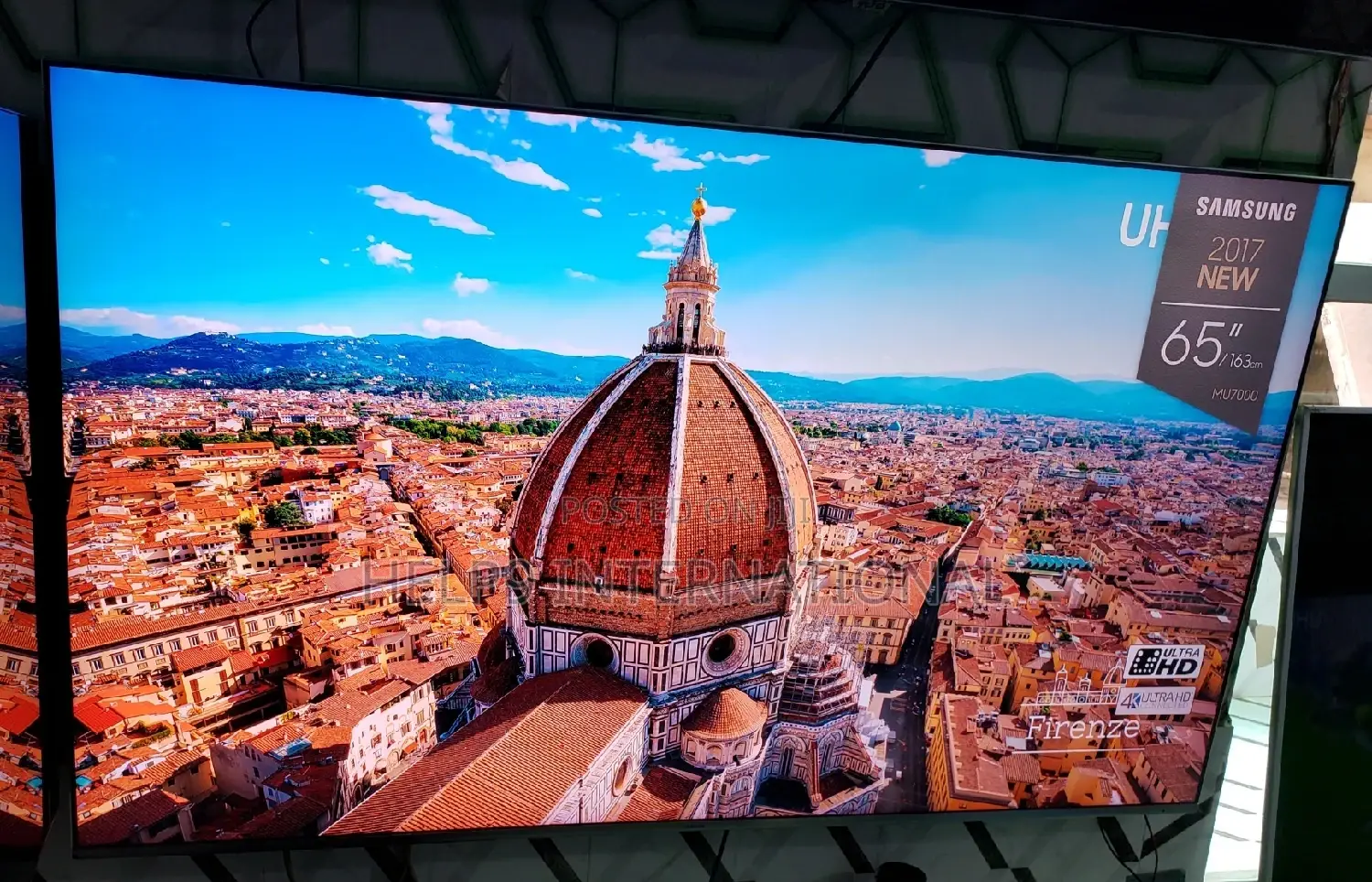 FRAMELESS 65” Samsung Premium UHD Smart TV
